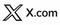 X_com